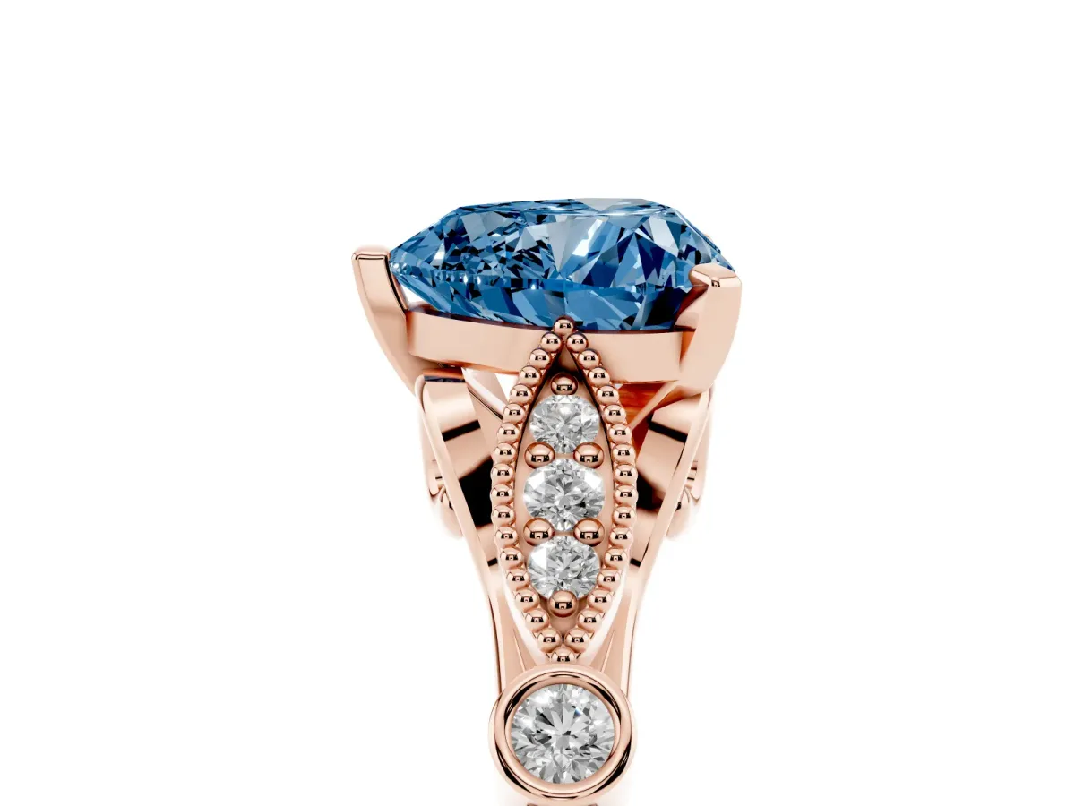 Fancy Blue Heart Cut Cut Diamond with Milgrain Marquise and Bezel Accents on a Solitaire Band with Prong Setting Rose gold
