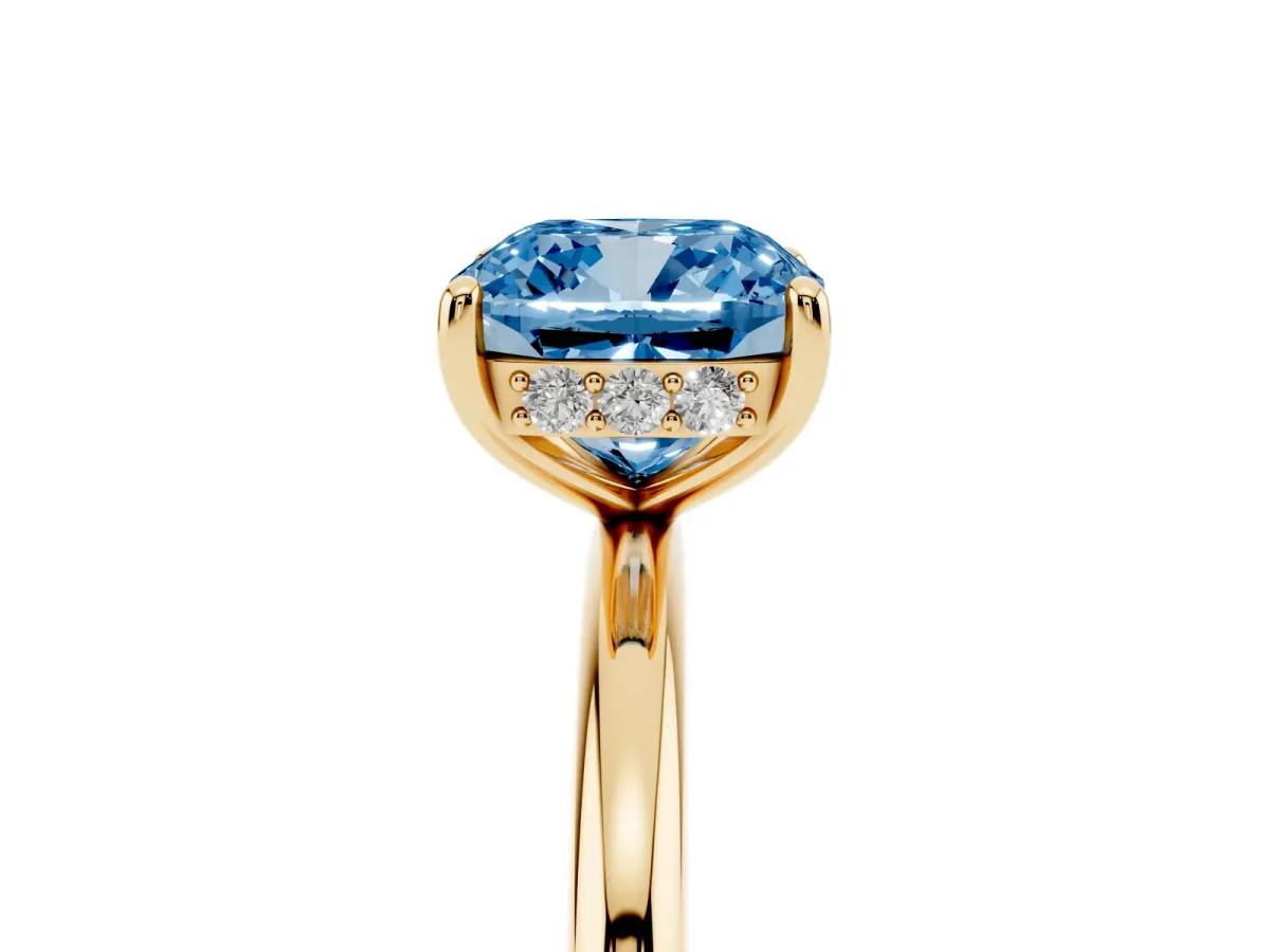 Fancy Blue Cushion Cut Solitaire Diamond Ring with a Classic Band and Four-Prong Setting Yellow gold