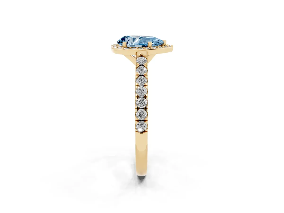 Fancy Blue Pear Cut Cut Halo Diamond Engagement Ring with Pave Band and Four-Prong Setting Yellow gold
