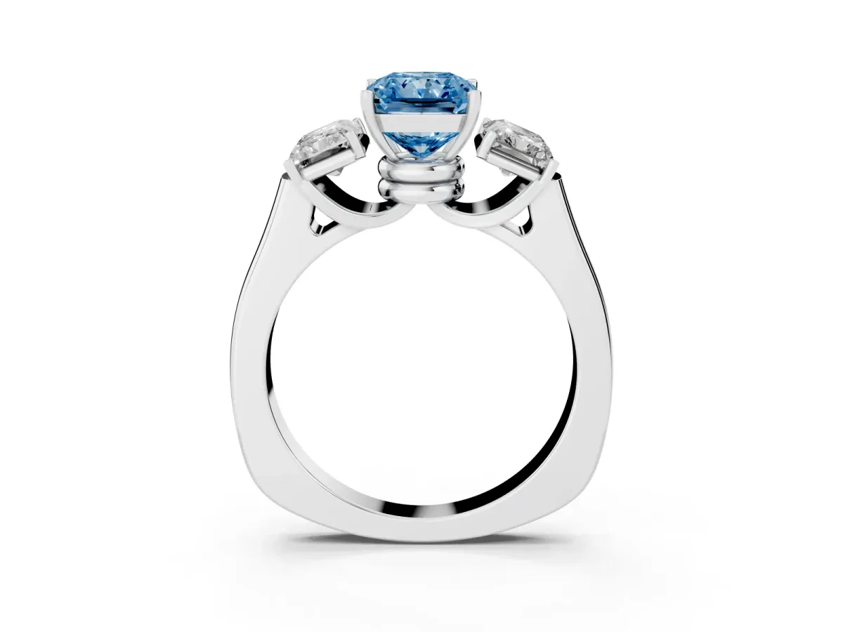 Fancy Blue Three-Stone Radiant Cut Brilliant Diamond Trellis Ring with Comfort Fit Band Platinum