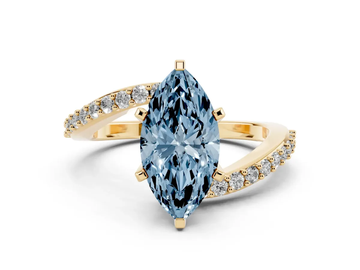 Fancy Blue Marquise Cut Solitaire Twist Band with Pave Set Diamonds and Four-Prong Setting Yellow gold
