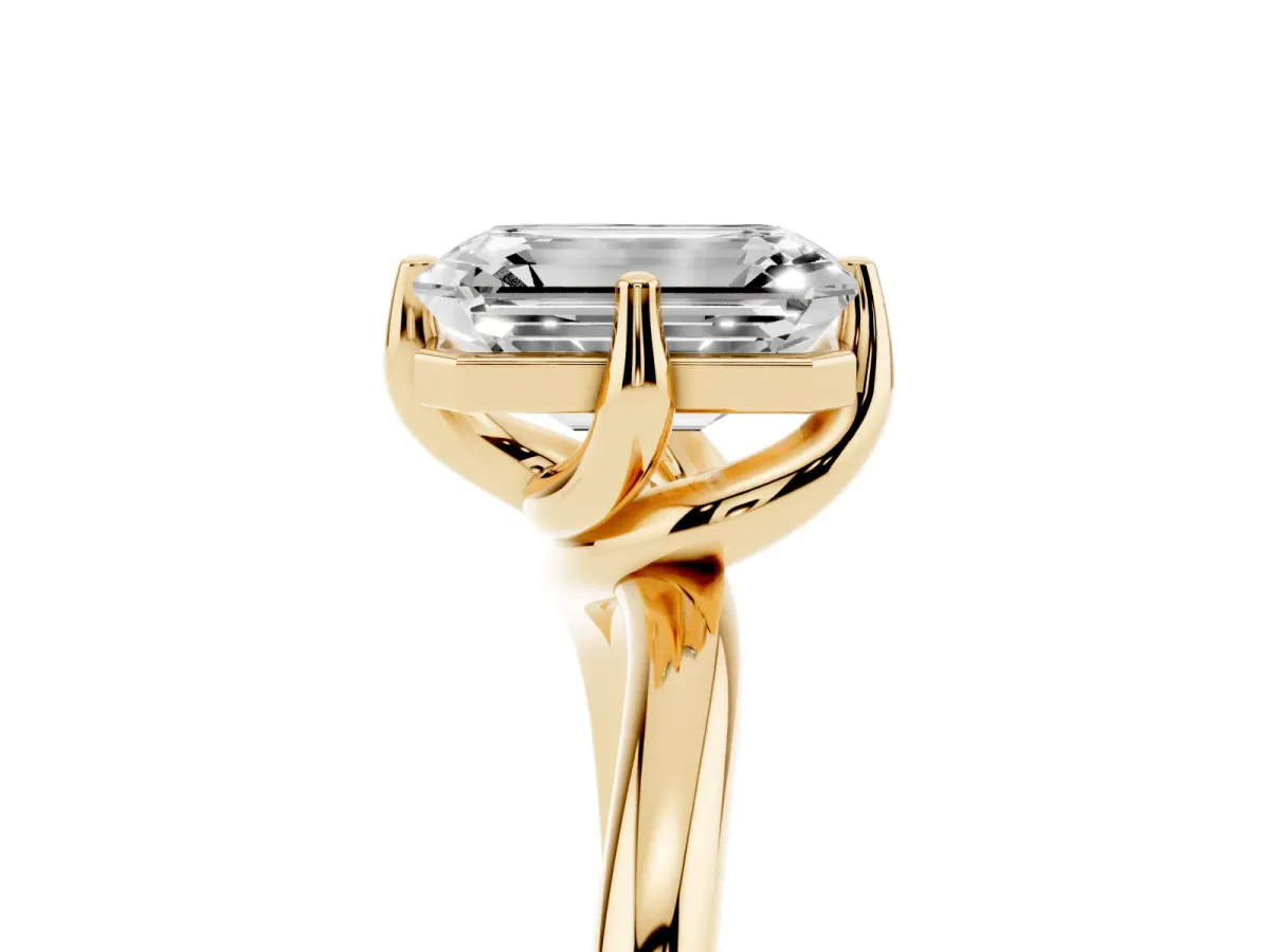 Emerald Cut Diamond Solitaire Engagement Ring with Four-Prong Setting and Classic Band Yellow gold