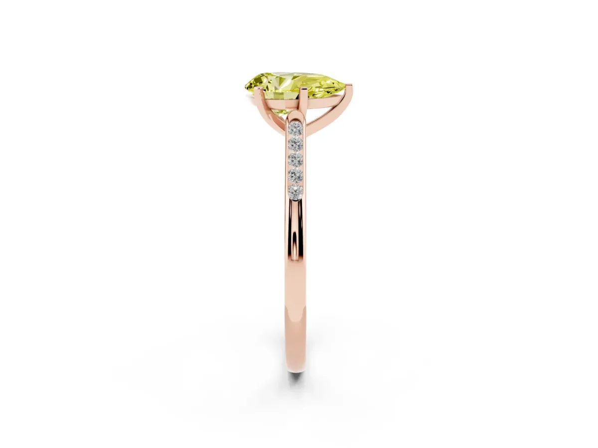 Fancy Yellow Pear Cut Diamond Solitaire Ring with Channel Set Round Band and Prong Setting Rose gold