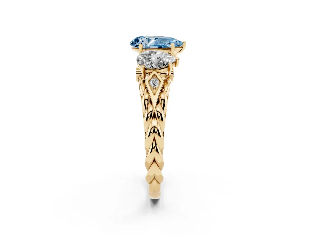 Fancy Blue Three-Stone Pear Cut Diamond Braided Band Ring with Four-Prong Setting Yellow gold