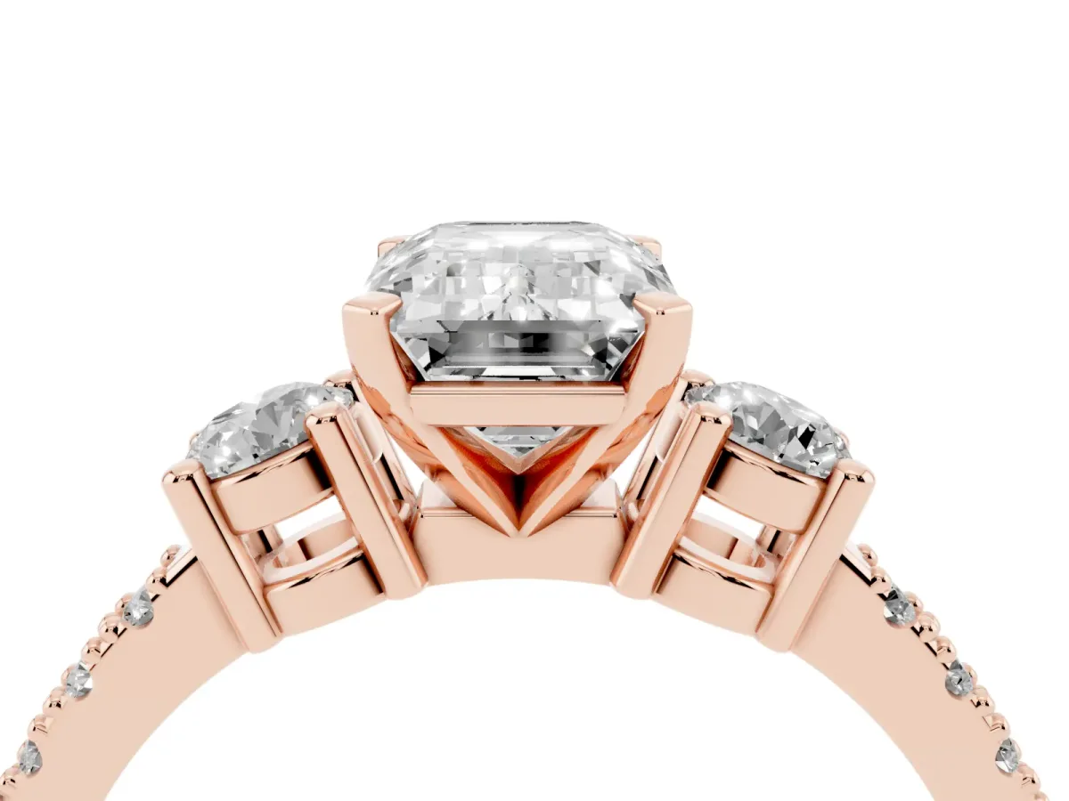 Emerald Cut Three-Stone Diamond Pavé Band with Prong Setting Rose gold