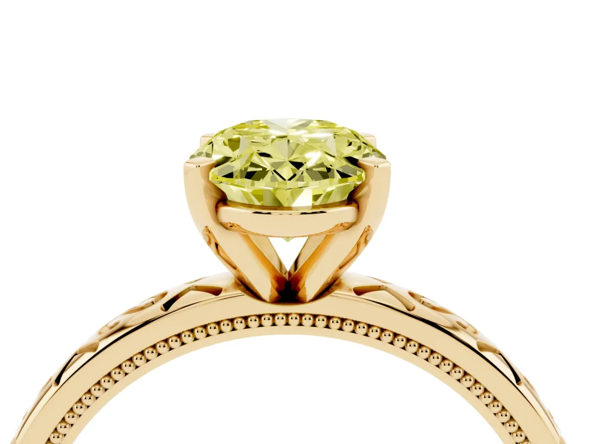 Fancy Yellow Oval Cut Solitaire Engagement Ring with Scrollwork Band and Four-Prong Setting Yellow gold