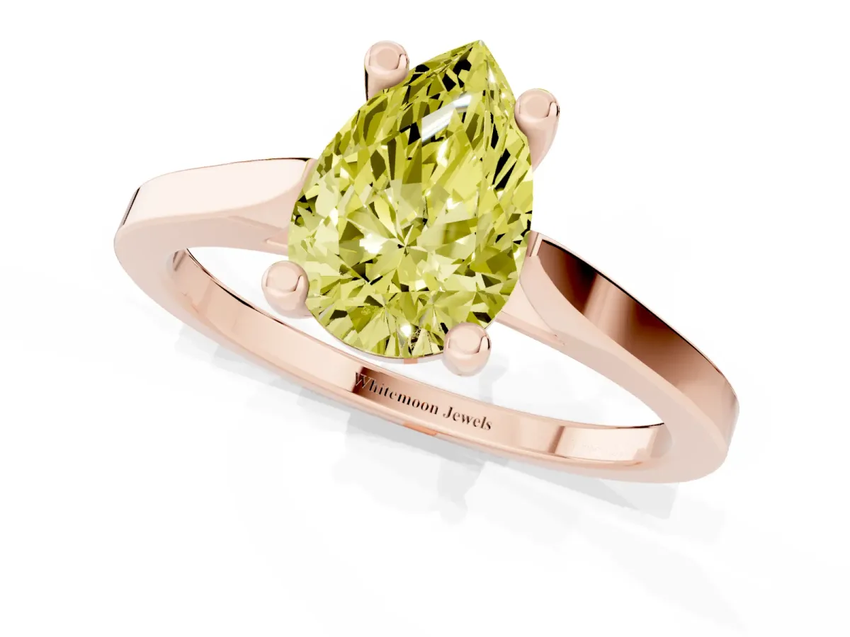 Fancy Yellow Pear Cut Solitaire Diamond Ring with Four-Prong Setting and Tapered Band Rose gold