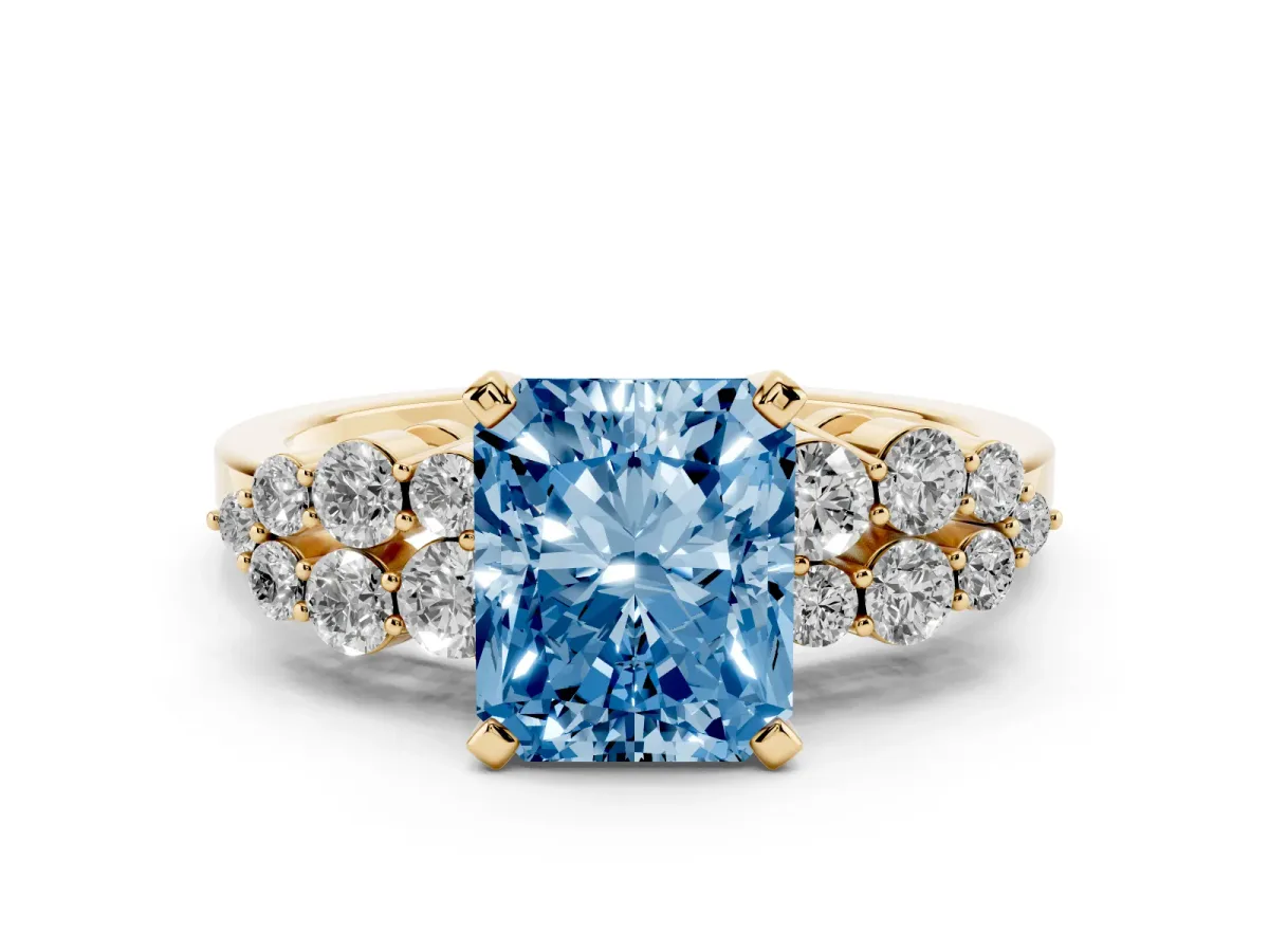 Fancy Blue Radiant Cut Cluster Diamond Engagement Ring with Pavé Band and Four-Prong Setting Yellow gold