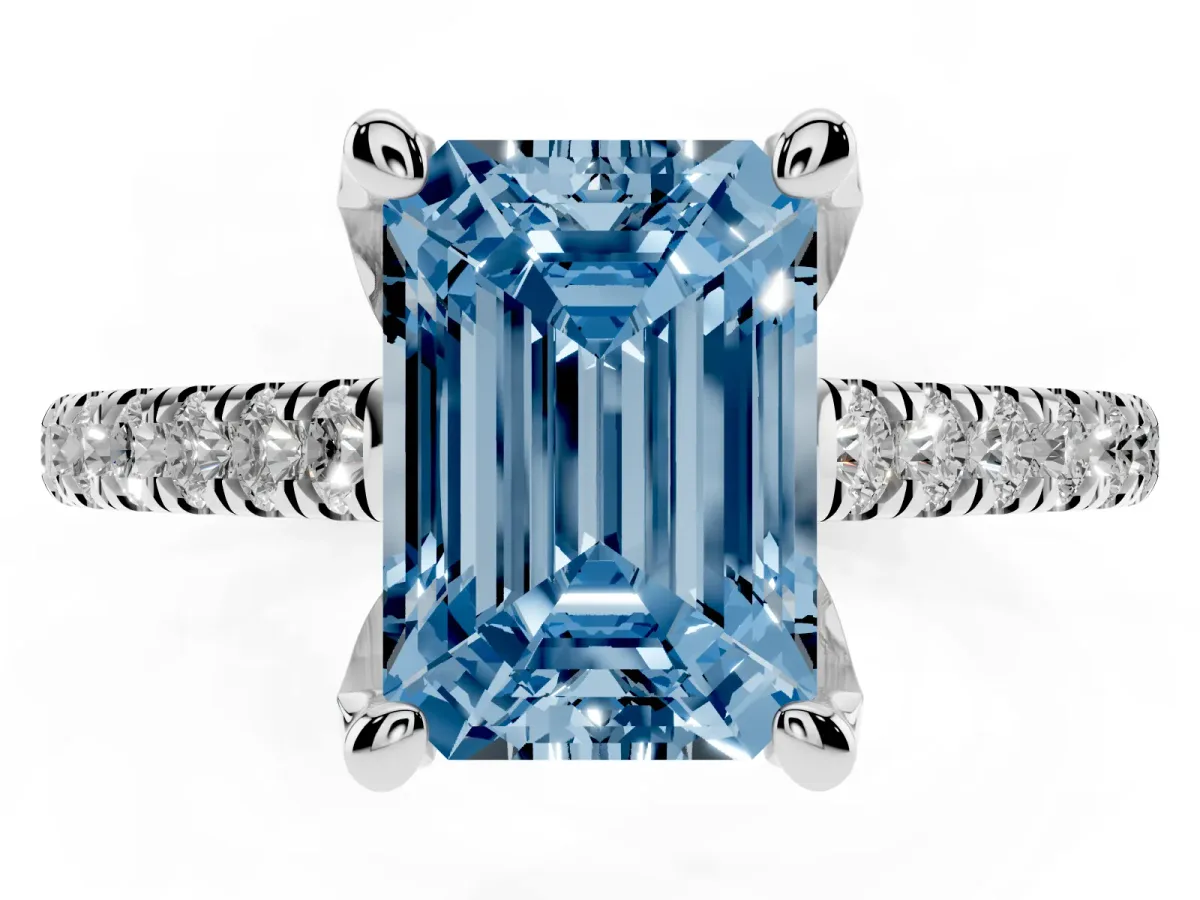 Fancy Blue Emerald Cut Brilliant Diamond Solitaire with Pavé Band and Four-Prong Setting Platinum