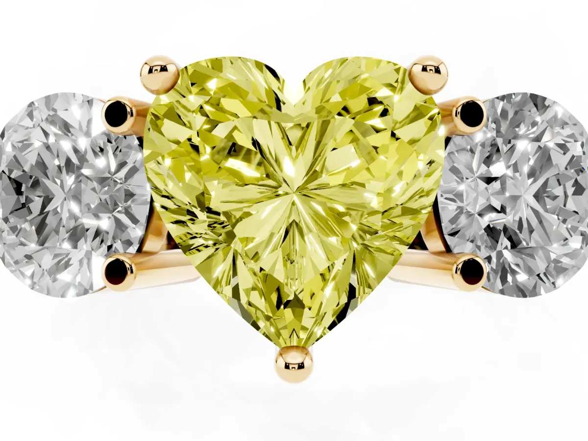 Fancy Yellow Three-Stone Heart Cut Brilliant Cut Solitaire Ring with Prong Setting on a Classic Band Yellow gold