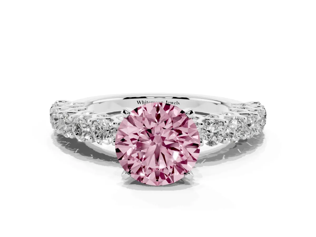 Fancy Pink Round Cut Diamond Solitaire Ring with Shared Prong Pavé Band and Four-Prong Setting Silver