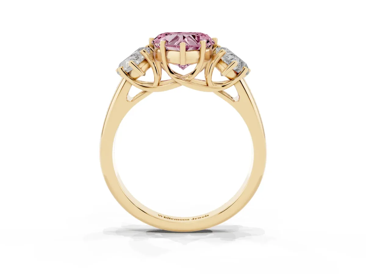 Fancy Pink Three-Stone Heart Cut Diamond Engagement Ring with Prong Setting Yellow gold