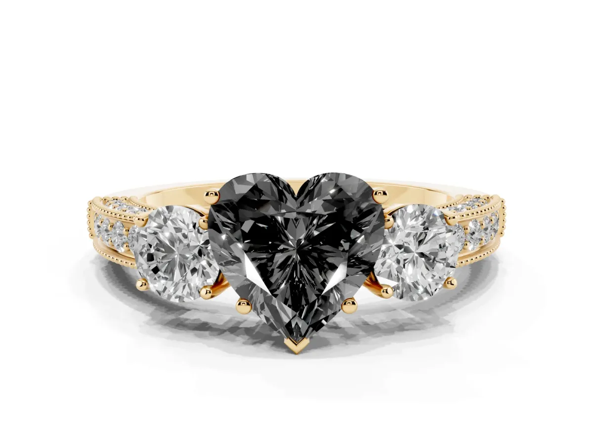 Fancy Black Heart Cut Three-Stone Diamond Ring with Pavé Band and Four-Prong Setting Yellow gold
