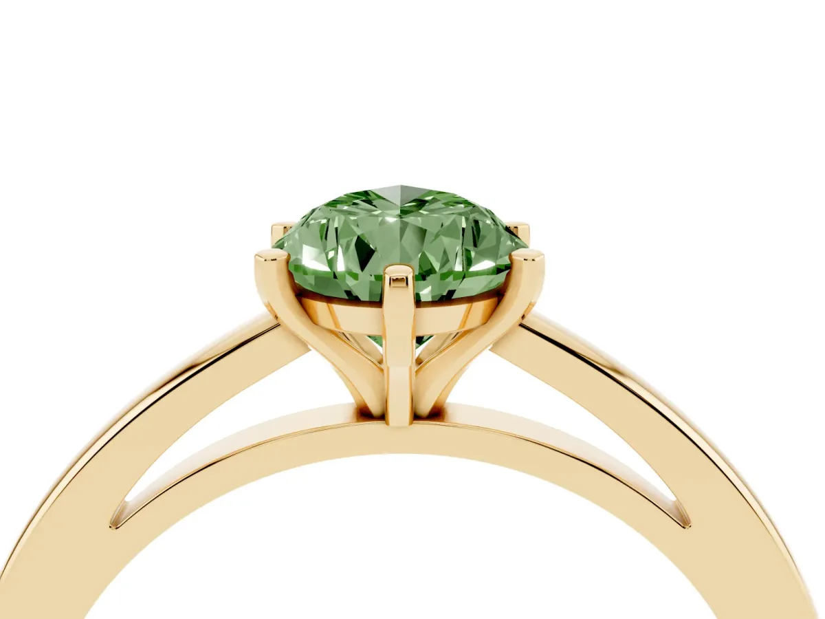Fancy Green Pear Cut Solitaire Diamond Engagement Ring with Four-Prong Setting on a Classic Band Yellow gold