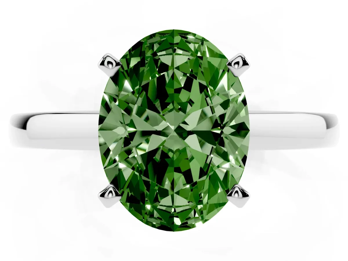 Fancy Green Oval Cut Solitaire Diamond Engagement Ring with Four-Prong Setting on a Classic Band Silver