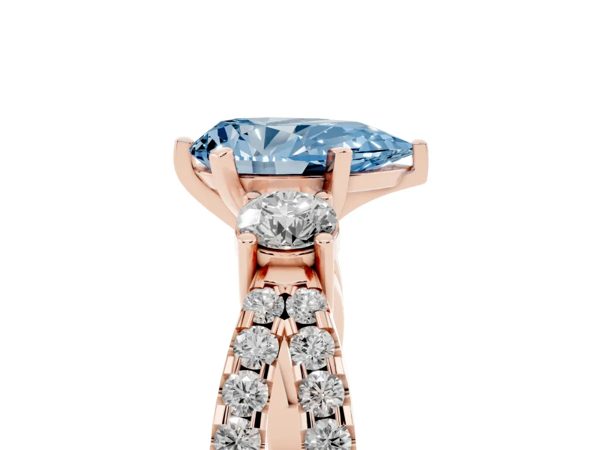 Fancy Blue Pear Cut Diamond Three-Stone Ring with Pavé Split Shank and Four-Prong Setting Rose gold