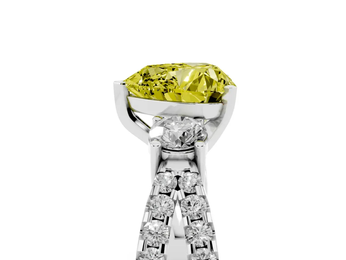 Fancy Yellow Heart Cut Diamond Three-Stone Ring with Pavé Split Shank and Four-Prong Setting Platinum