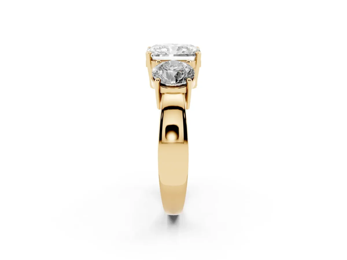 Three-Stone Radiant Cut Diamond Ring with Round Side Stones, Classic Band, and Four-Prong Setting Yellow gold