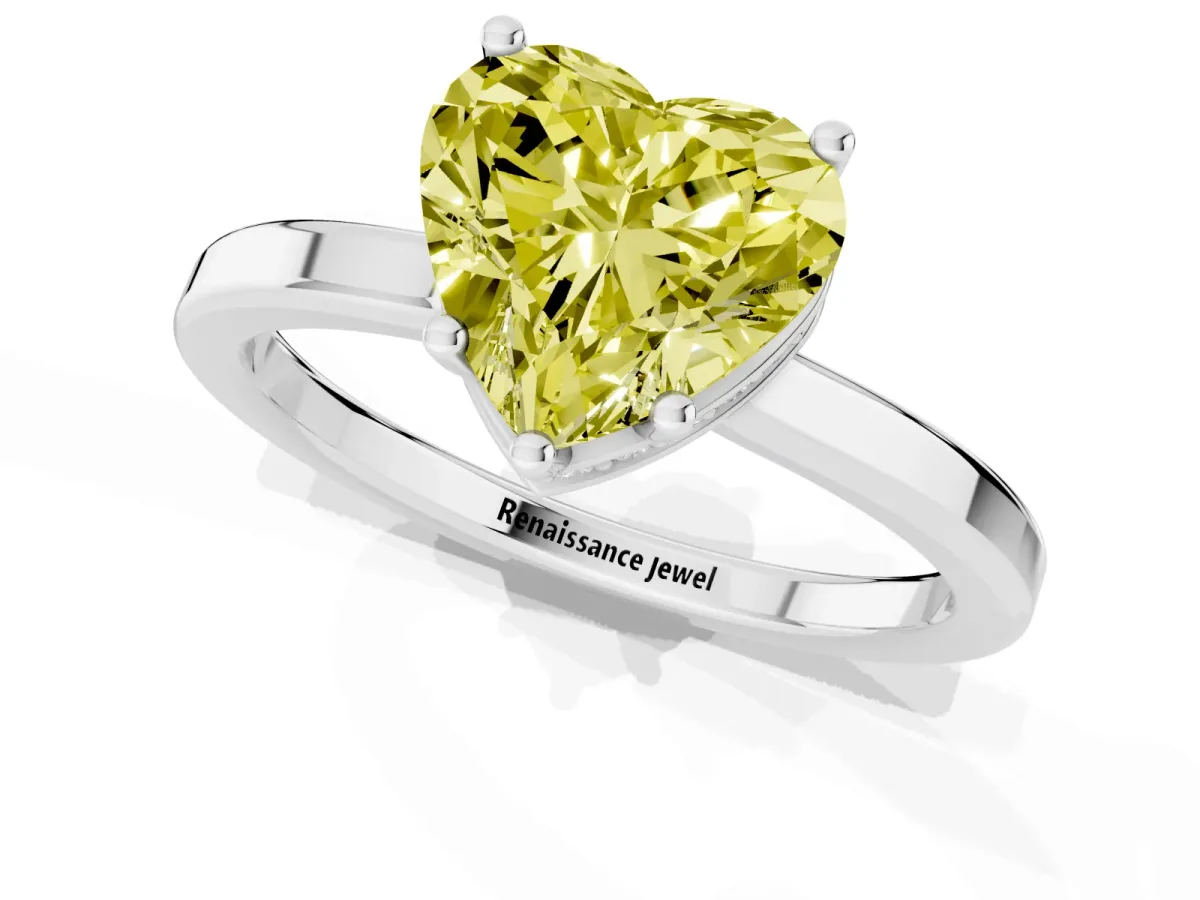 Fancy Yellow Heart Cut Cut Solitaire Engagement Ring with Four-Prong Setting on a Classic Band Silver