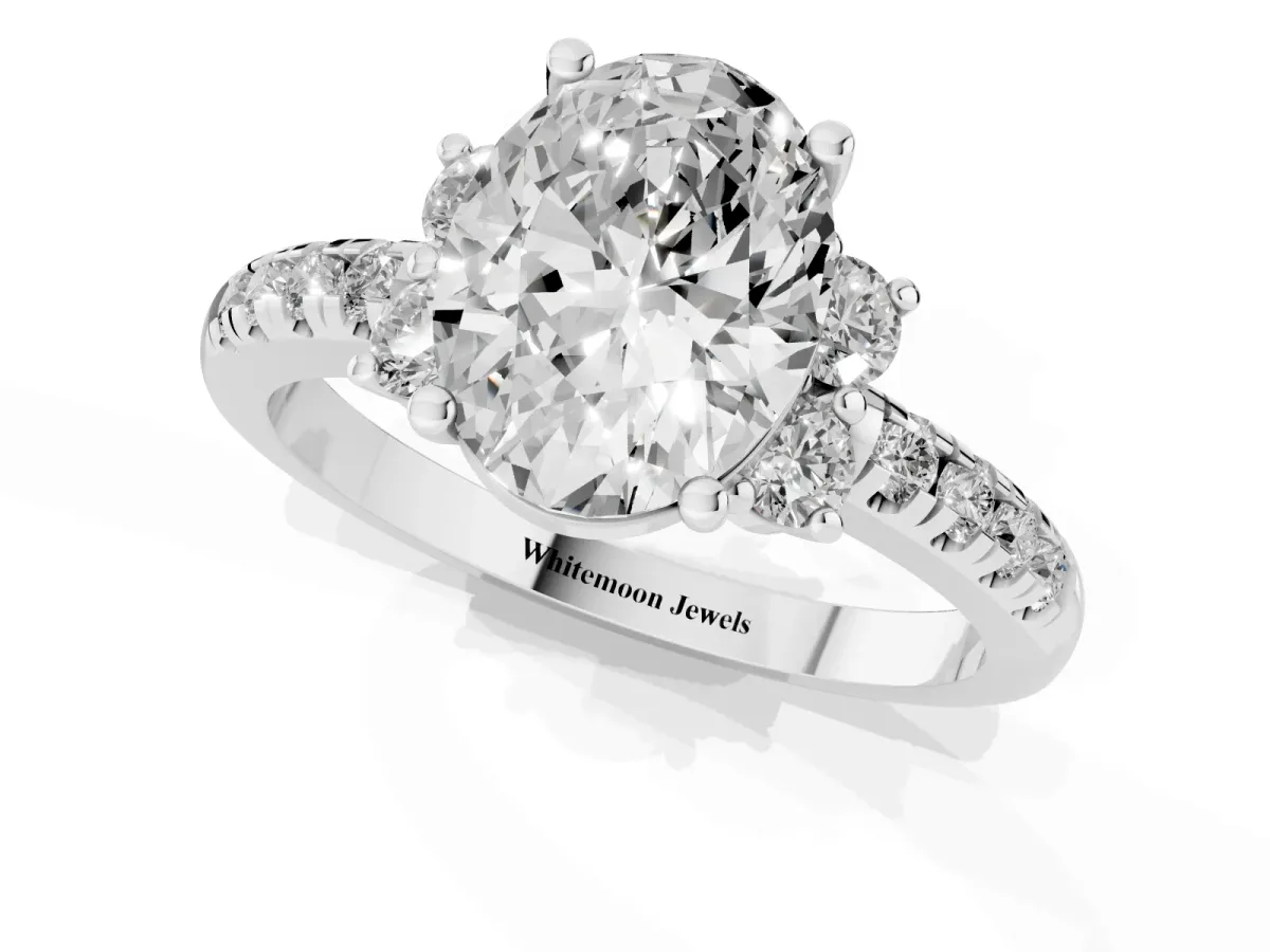 Oval Cut Diamond Three-Stone Pave Band with Four-Prong Setting Platinum