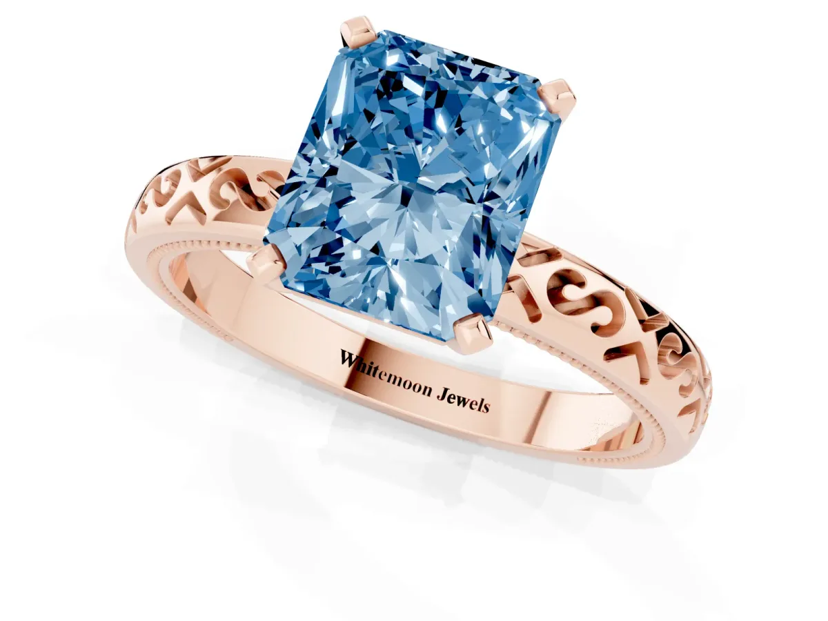 Fancy Blue Radiant Cut Solitaire Engagement Ring with Scrollwork Band and Four-Prong Setting Rose gold