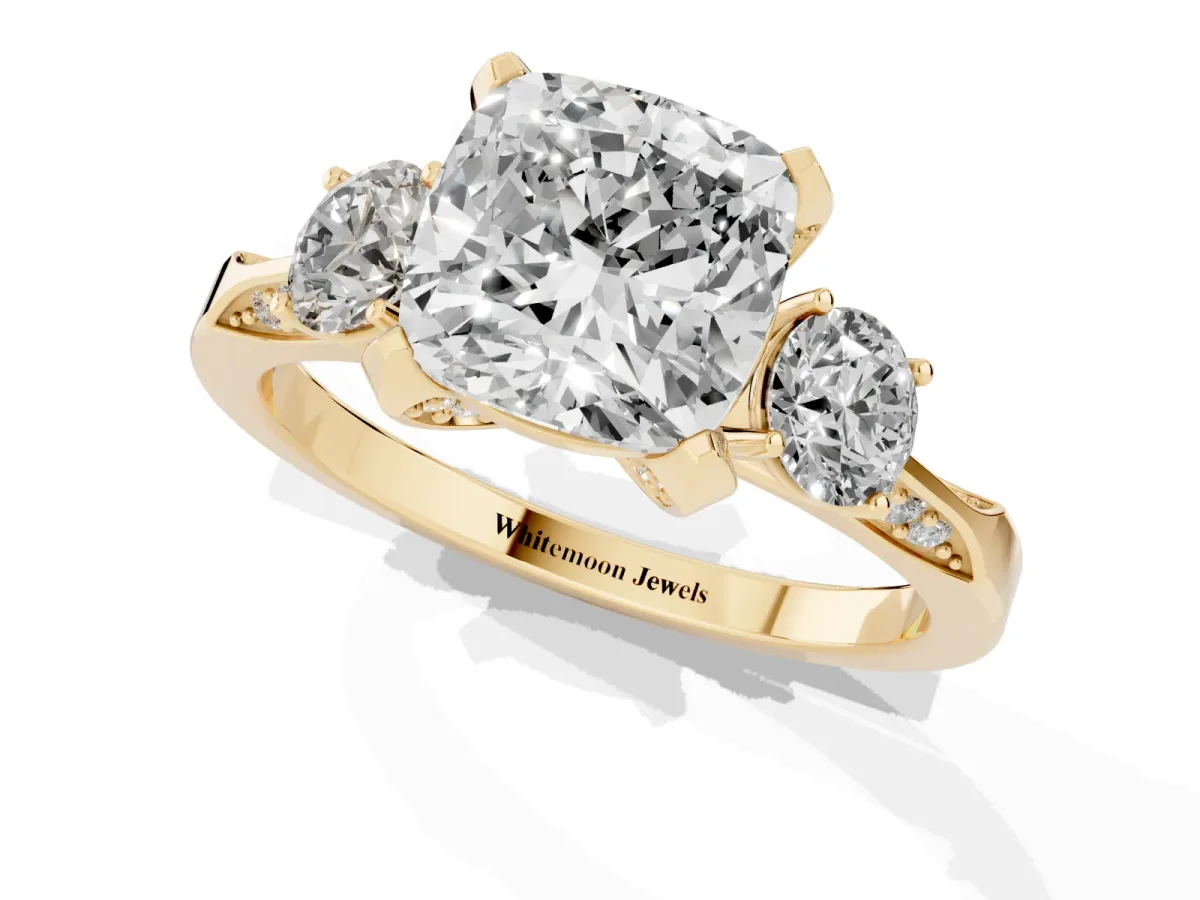 Cushion Cut Brilliant Three-Stone Diamond Ring with Pavé Band and Four-Prong Setting Yellow gold