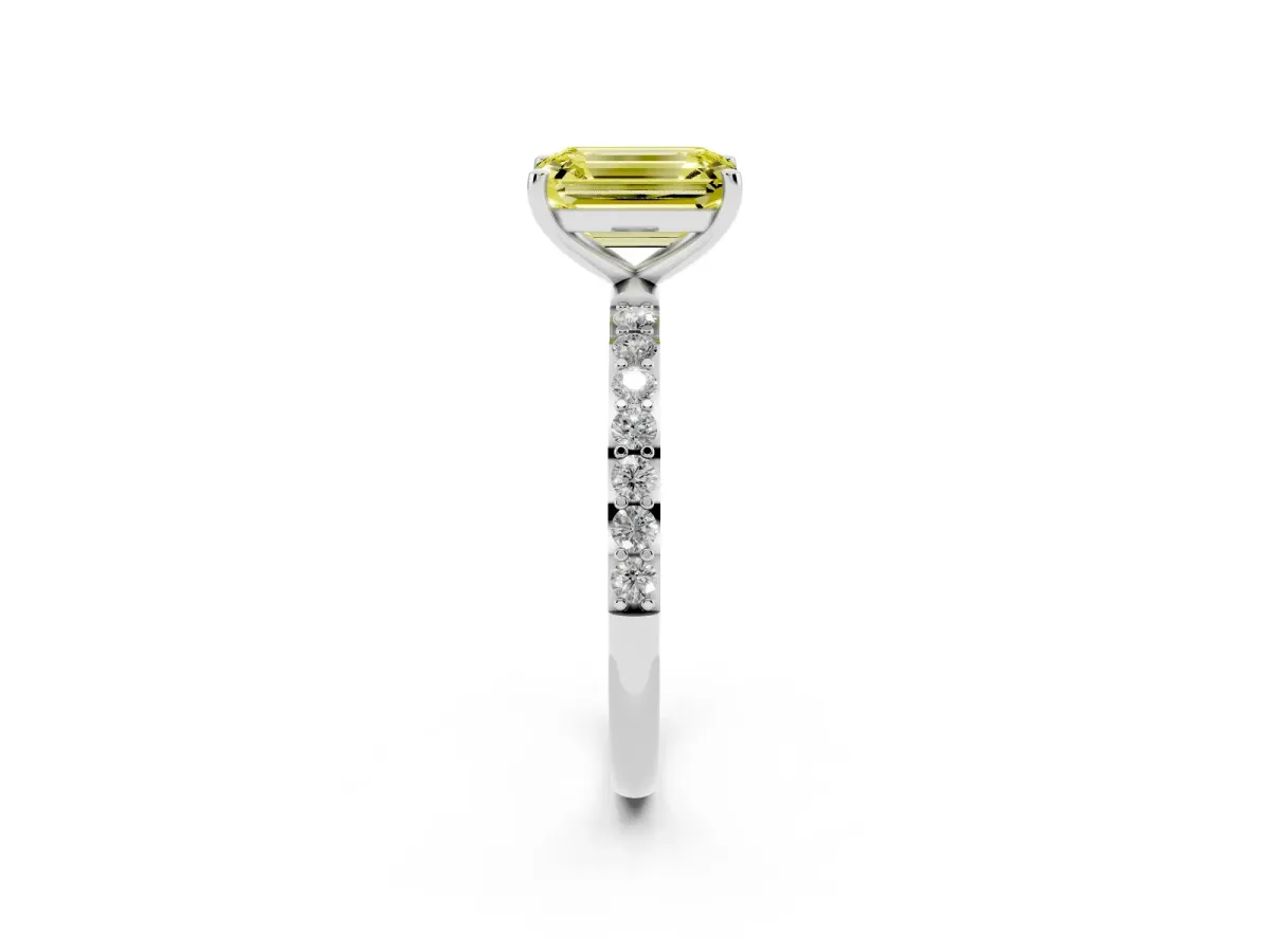 Fancy Yellow Emerald Cut Diamond Solitaire Ring with Round Pavé Shoulders and Prong Setting Platinum