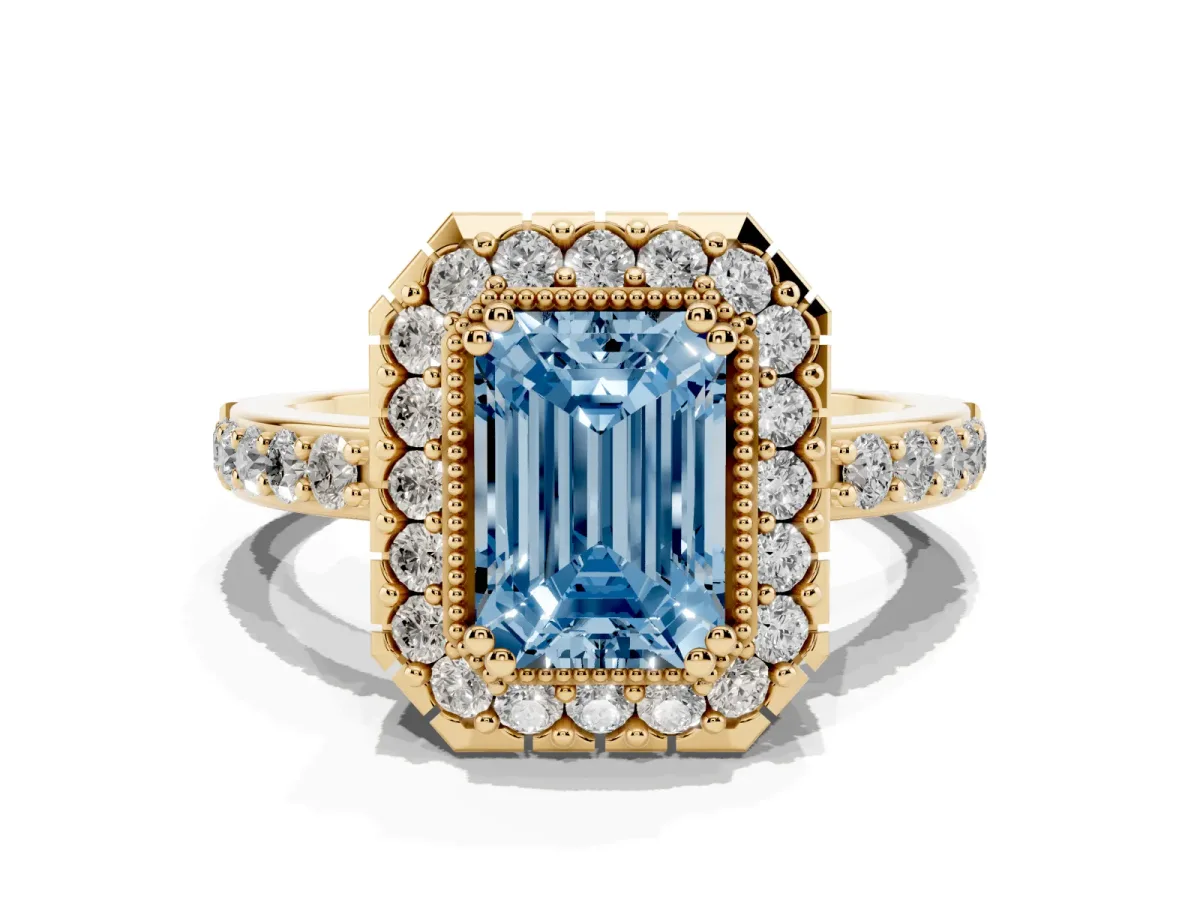 Fancy Blue Emerald Cut Diamond Halo Ring with Pavé Band and Prong Setting Yellow gold