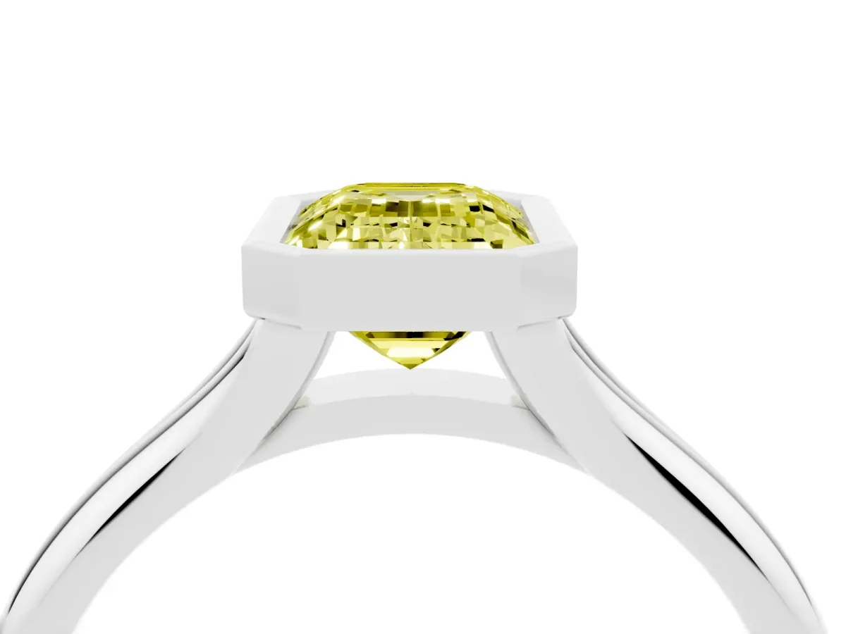 Fancy Yellow Bezel Set Emerald Cut Solitaire Diamond Ring with Smooth Band Silver