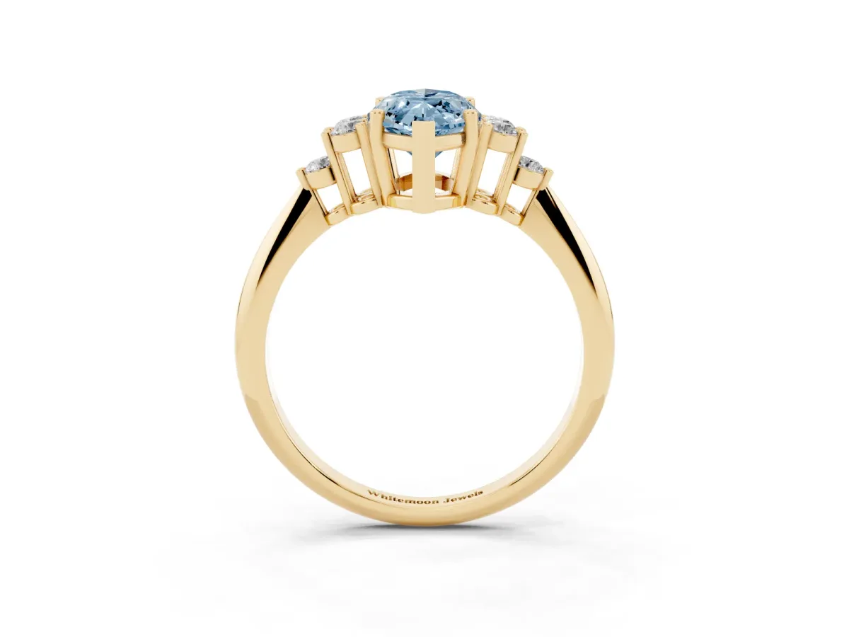 Fancy Blue Marquise Cut Cut Diamond Cluster Ring with Solitaire Band and Four-Prong Setting Yellow gold