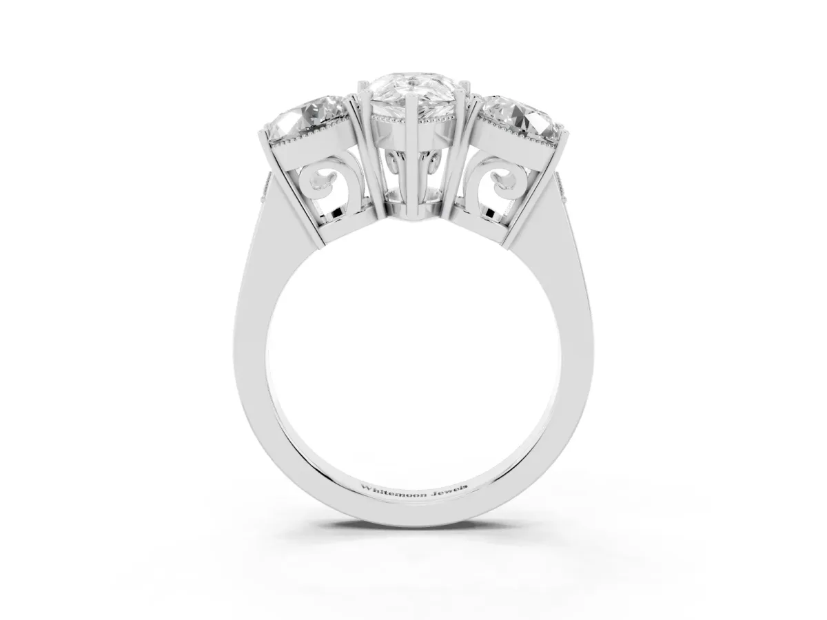 Three-Stone Pear Cut Diamond Engagement Ring with Prong Setting on a Classic Band Silver
