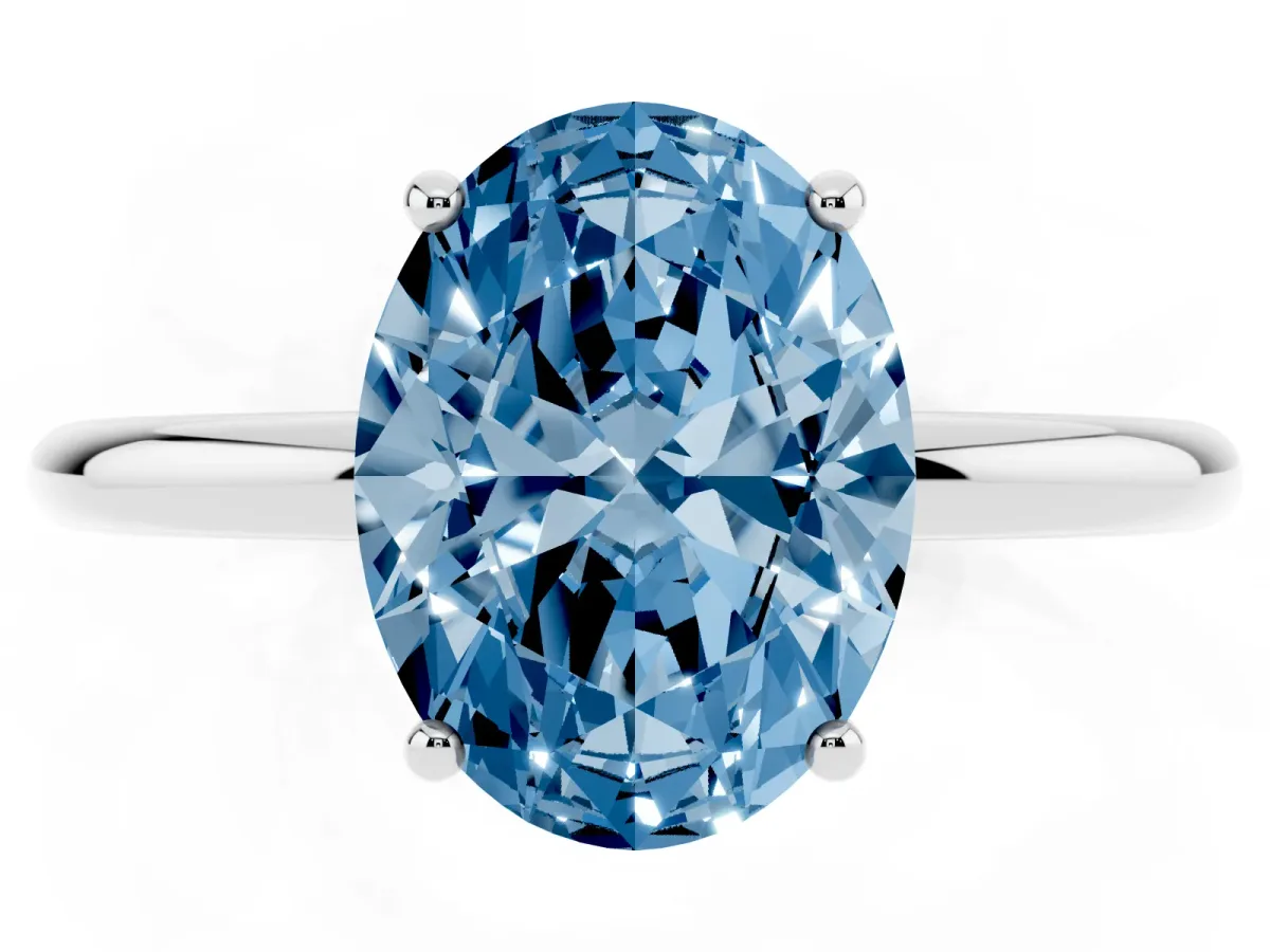 Fancy Blue Oval Cut Solitaire Diamond Ring with a Classic Band and Four-Prong Setting Platinum
