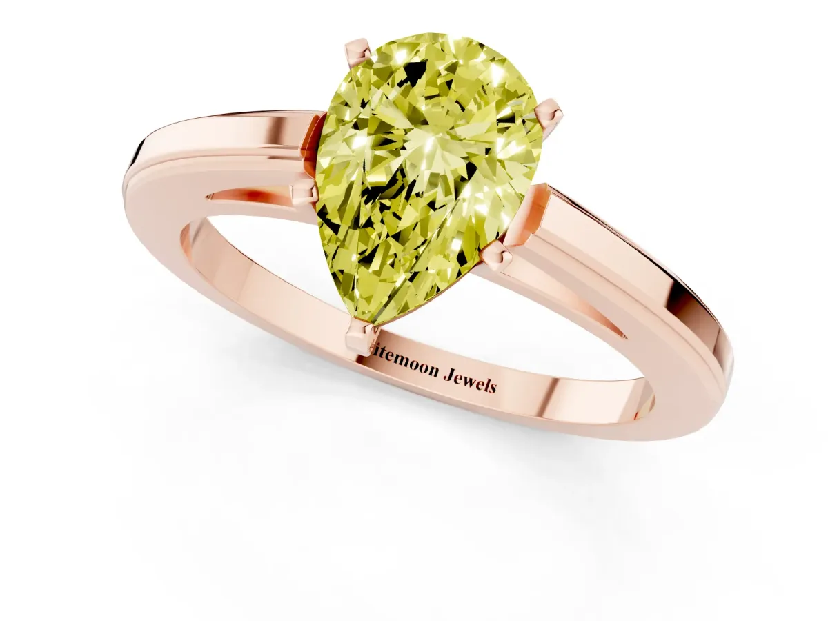 Fancy Yellow Pear Cut Solitaire Diamond Ring with Four-Prong Setting and Classic Band Rose gold
