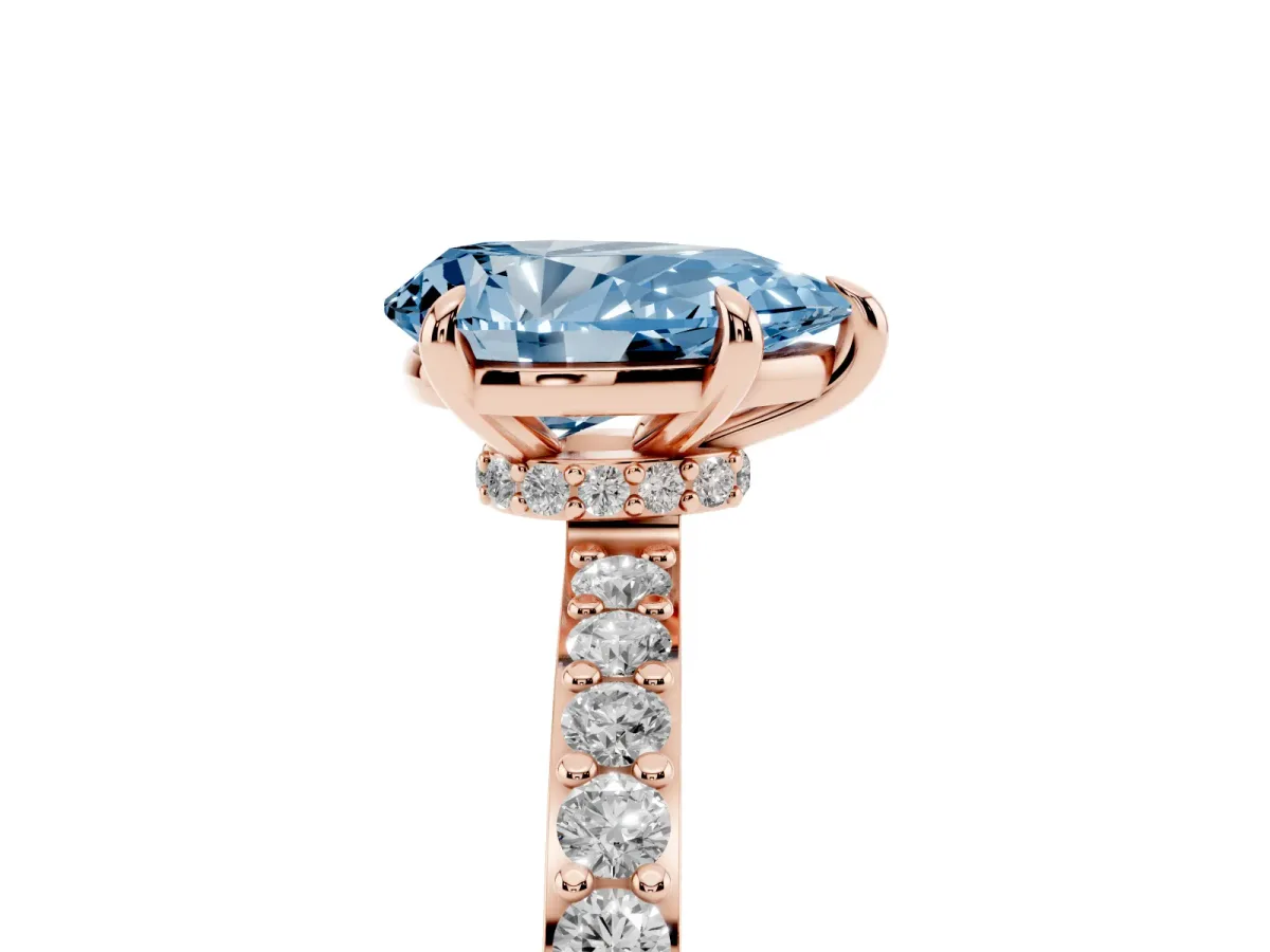 Fancy Blue Pear Cut Diamond Pavé Engagement Ring with Round Accents and Prong Setting Rose gold