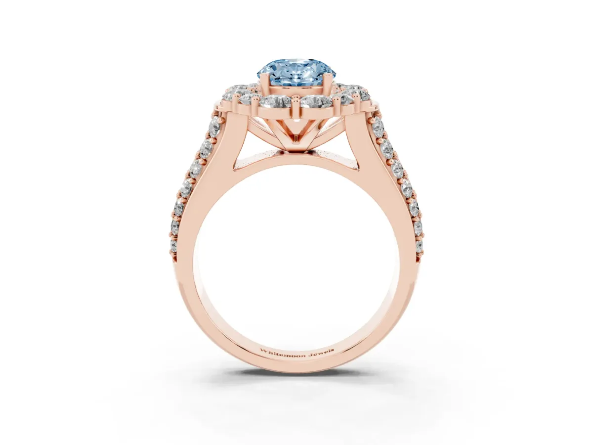 Fancy Blue Oval Cut Halo Diamond Engagement Ring with Split Shank and Prong Setting Rose gold