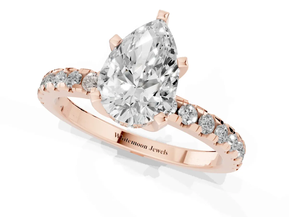 Pear Cut Diamond Solitaire Ring with Round Pavé Band and Four-Prong Setting Rose gold
