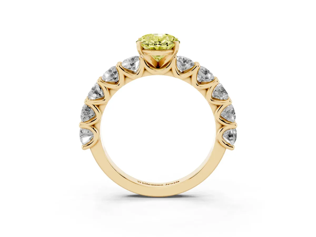 Fancy Yellow Oval Cut Diamond Prong Setting with Side Stones on a Pave Band Yellow gold