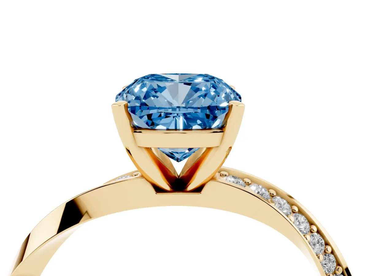 Fancy Blue Cushion Cut Diamond Engagement Ring with Side Stone Accents and Four-Prong Setting Yellow gold