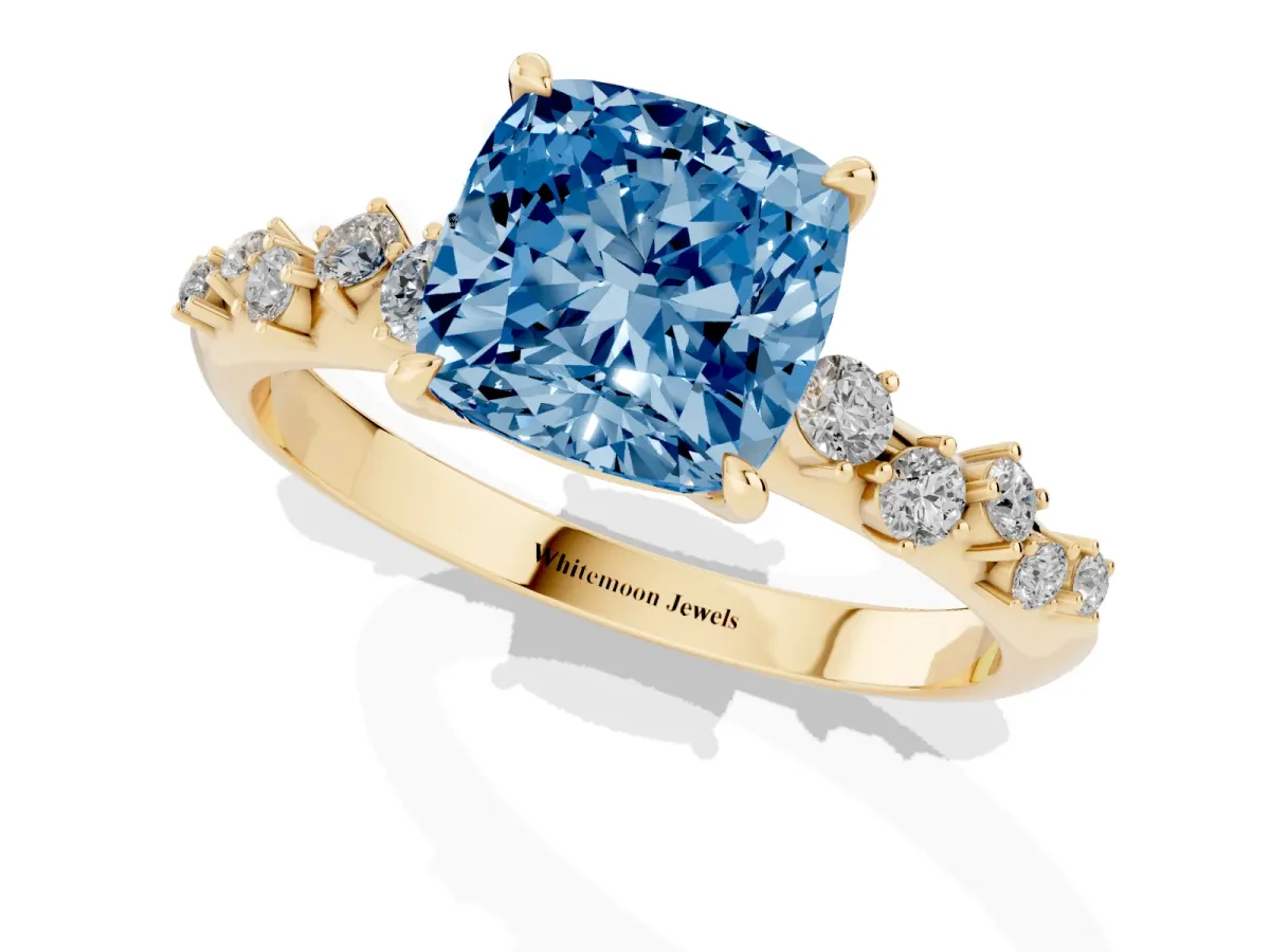 Fancy Blue Cushion Cut Diamond Cluster Side Stone Solitaire Ring with Prong Setting Yellow gold