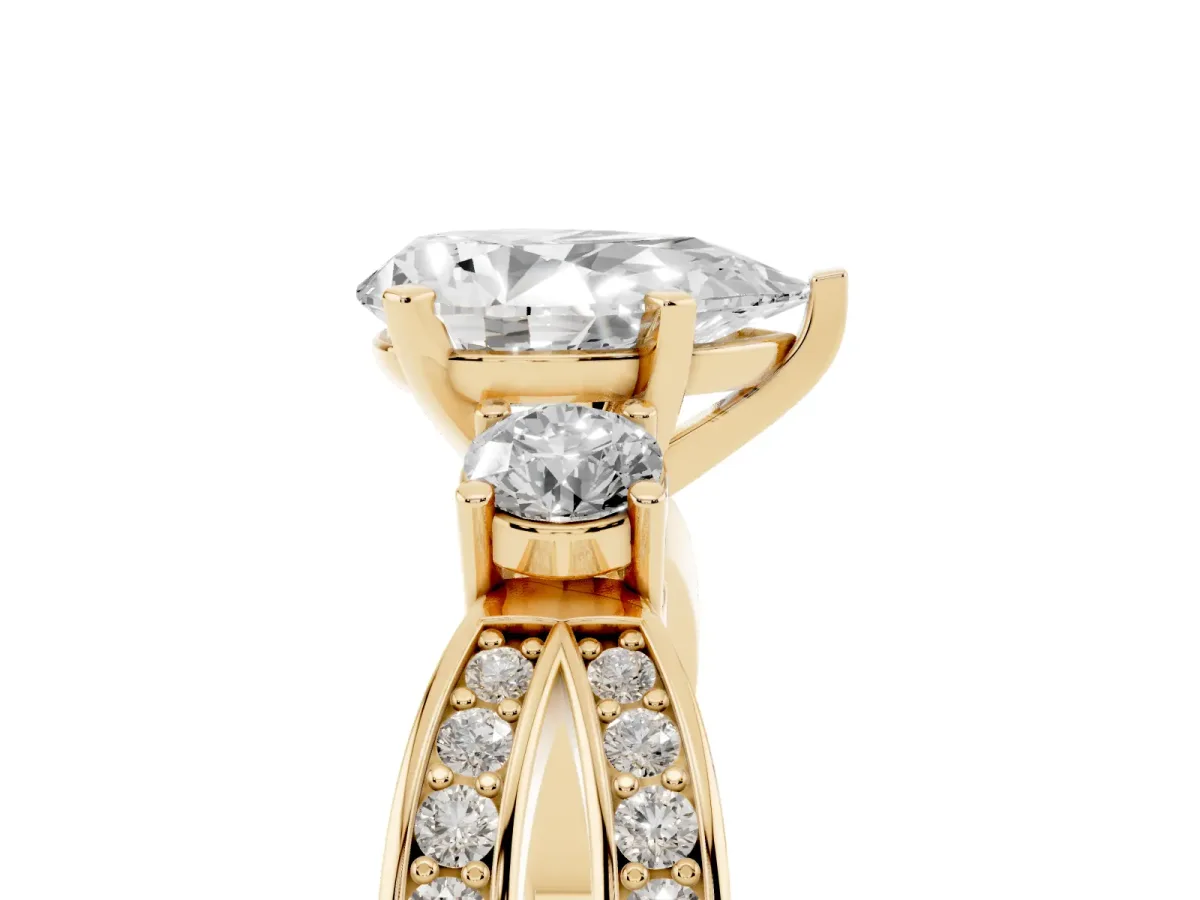 Three-Stone Pear Cut Cut Diamond Twist Band with Prong Setting Yellow gold