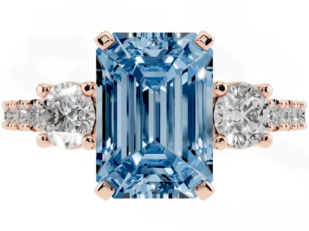 Fancy Blue Emerald Cut Three-Stone Diamond Pavé Band with Prong Setting Rose gold