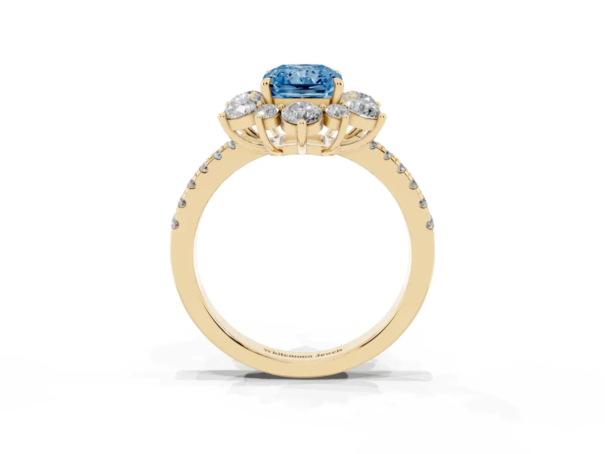 Fancy Blue Radiant Cut Diamond Floral Halo Ring with Round Pavé Band and Prong Setting Yellow gold