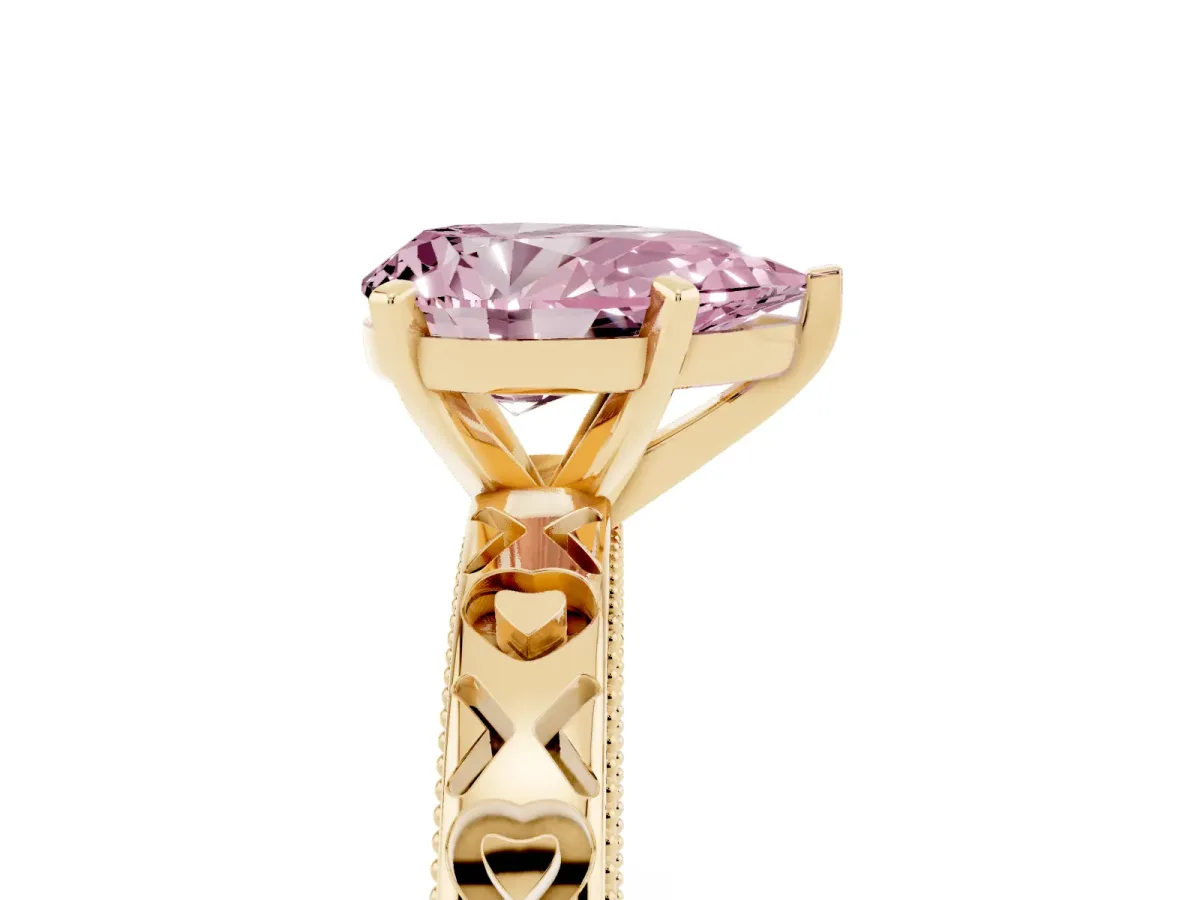 Fancy Pink Pear Cut Solitaire Diamond Engagement Ring with XO Engraved Band and Four-Prong Setting Yellow gold