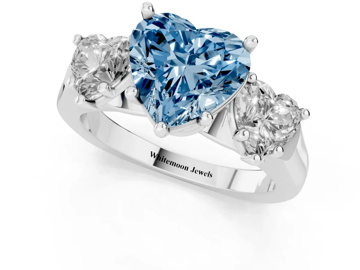 Fancy Blue Three-Stone Heart Cut Brilliant Diamond Trellis Ring with Comfort Fit Band Platinum