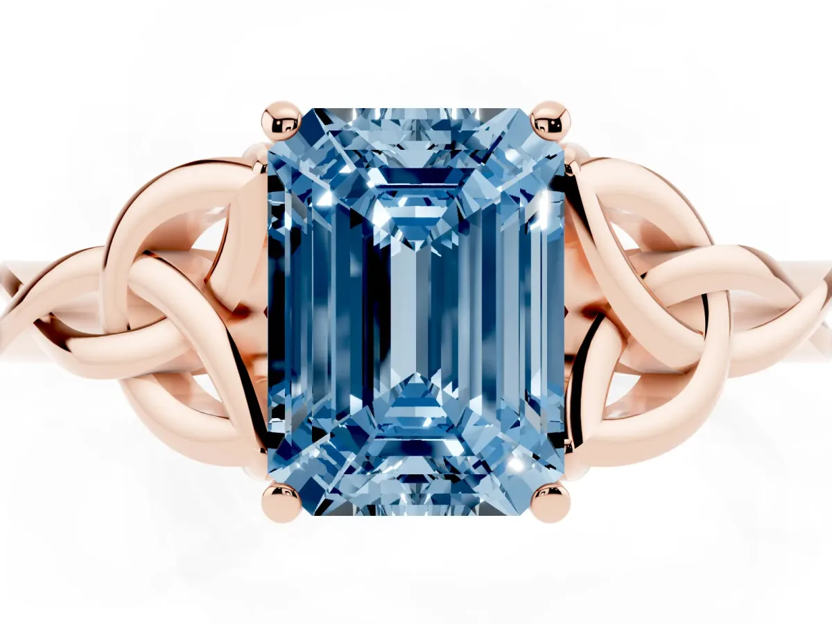 Fancy Blue Emerald Cut Diamond Solitaire Engagement Ring with Celtic Knot Band and Four-Prong Setting Rose gold