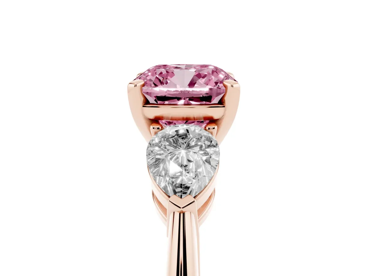 Fancy Pink Three-Stone Cushion Cut Diamond Ring with Pear Side Stones and Four-Prong Setting Rose gold