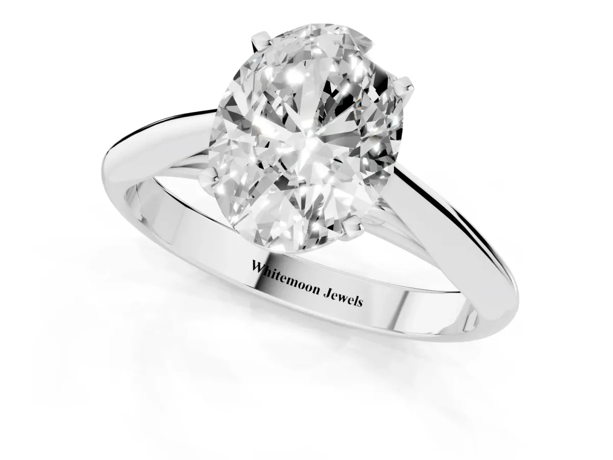 Oval Cut Diamond Solitaire Engagement Ring with Cathedral Setting and Four-Prong Mount Silver