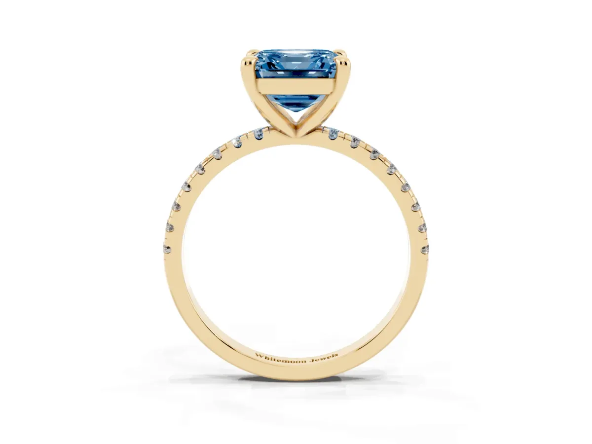 Fancy Blue Asscher Cut Diamond Brilliant Solitaire Ring with Pavé Band and Four-Prong Setting Yellow gold