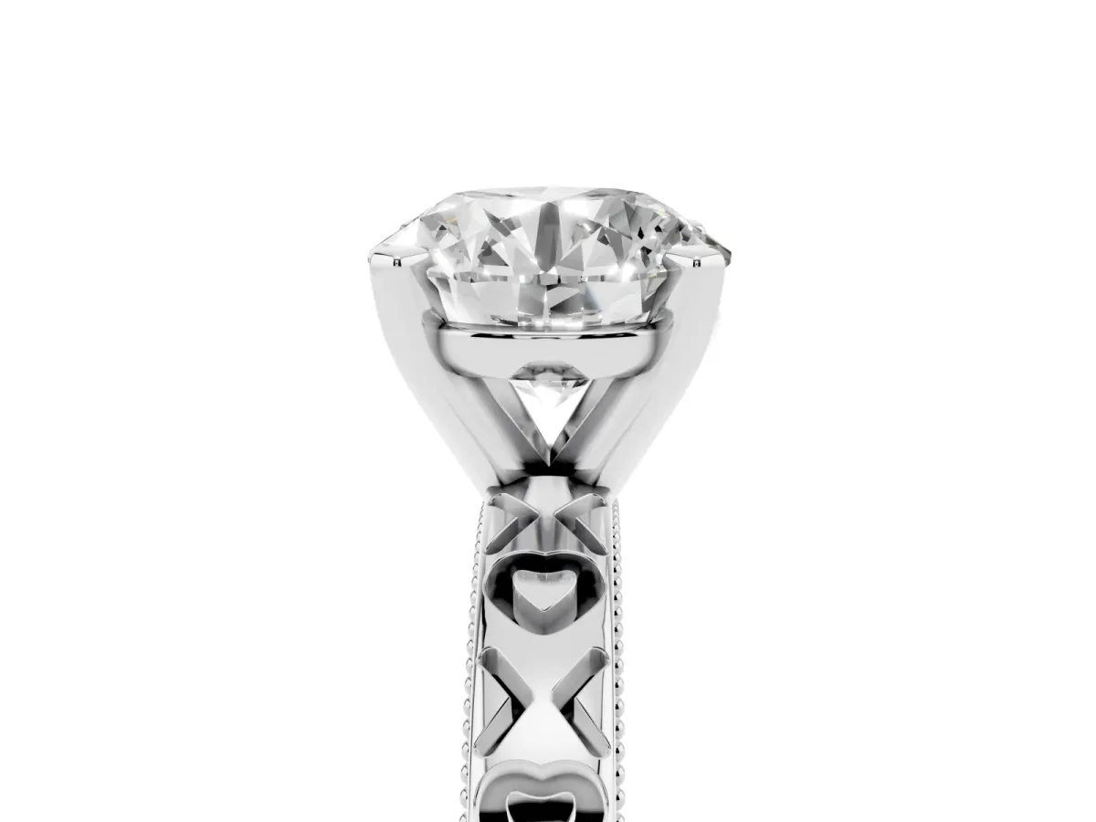 Round Cut Solitaire Diamond Engagement Ring with XO Engraved Band and Four-Prong Setting Silver