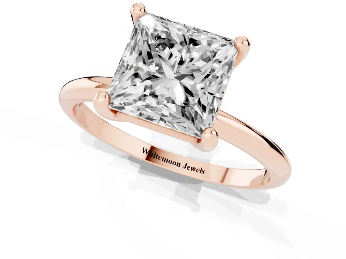 Princess Cut Solitaire Diamond Ring with 4-Prong Setting on a Classic Band Rose gold